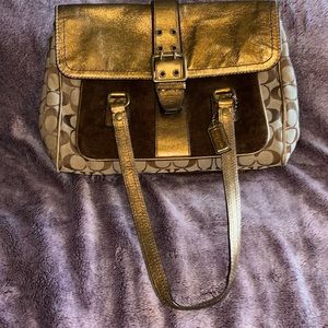 Brown, gold and suede Coach purse